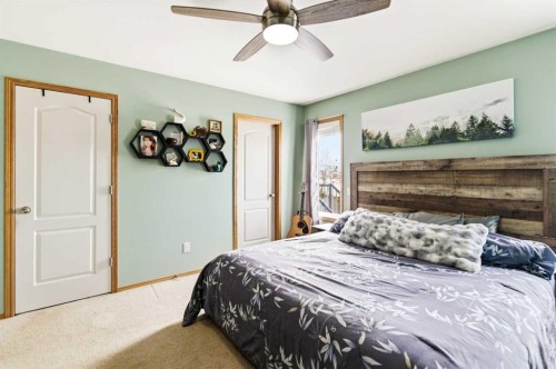 22 Mcdougall Close, Penhold, AB - Indoor Photo Showing Bedroom