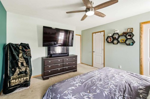 22 Mcdougall Close, Penhold, AB - Indoor Photo Showing Bedroom