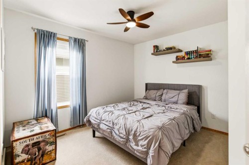 22 Mcdougall Close, Penhold, AB - Indoor Photo Showing Bedroom