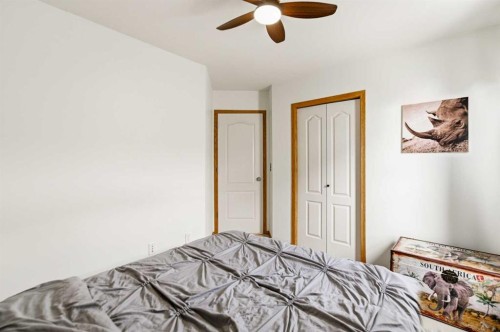 22 Mcdougall Close, Penhold, AB - Indoor Photo Showing Bedroom
