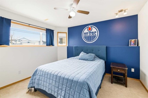 22 Mcdougall Close, Penhold, AB - Indoor Photo Showing Bedroom