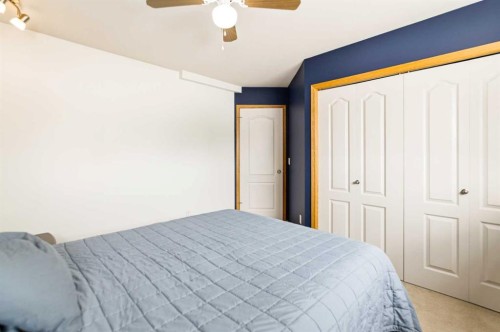 22 Mcdougall Close, Penhold, AB - Indoor Photo Showing Bedroom