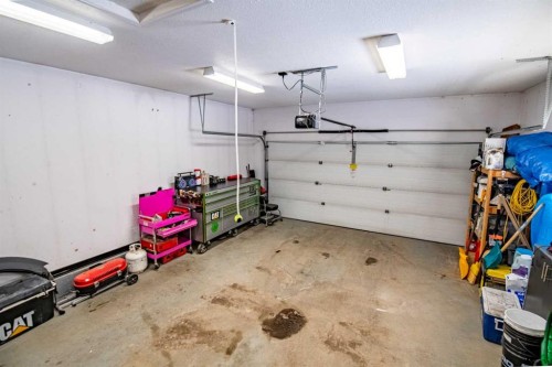 22 Mcdougall Close, Penhold, AB - Indoor Photo Showing Garage