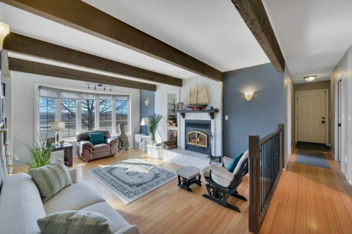5317 50 Street, Bentley, AB - Indoor Photo Showing Living Room With Fireplace