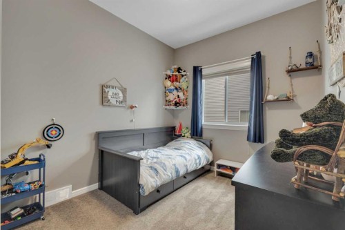 94 Mackenzie Crescent, Lacombe, AB - Indoor Photo Showing Bedroom