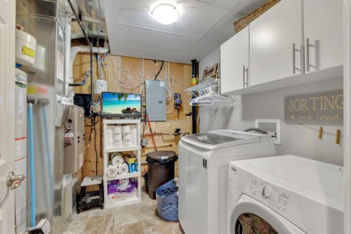 94 Mackenzie Crescent, Lacombe, AB - Indoor Photo Showing Laundry Room