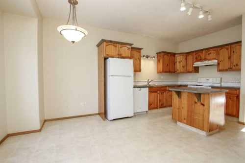 25 Adams Close, Red Deer, AB - Indoor Photo Showing Kitchen With Double Sink