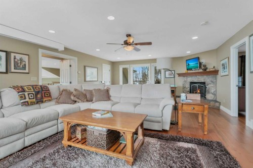 57-39408 Range Road 21, Rural Lacombe County, AB - Indoor Photo Showing Living Room With Fireplace