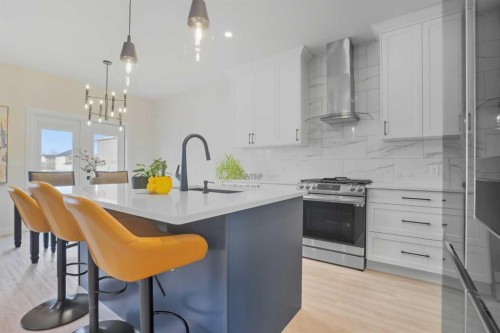 30 Palmer Circle, Blackfalds, AB - Indoor Photo Showing Kitchen With Upgraded Kitchen