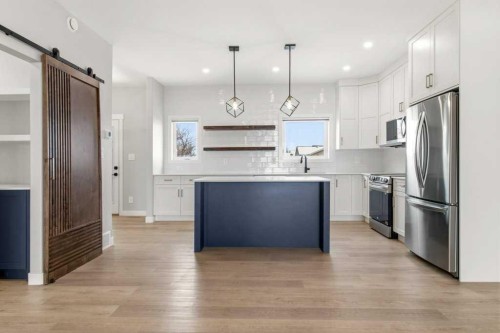 4307 48 Avenue, Sylvan Lake, AB - Indoor Photo Showing Kitchen With Upgraded Kitchen