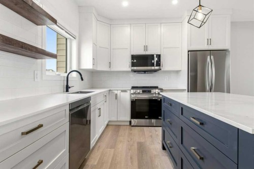4307 48 Avenue, Sylvan Lake, AB - Indoor Photo Showing Kitchen With Upgraded Kitchen