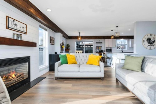 85 Hathaway Lane, Lacombe, AB - Indoor Photo Showing Living Room With Fireplace