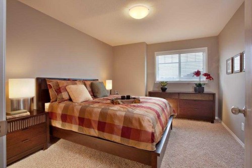 10 Ross Close, Sylvan Lake, AB - Indoor Photo Showing Bedroom