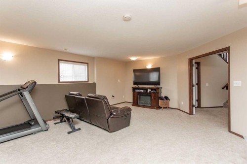 35 Landry Bend, Red Deer, AB - Indoor Photo Showing Gym Room