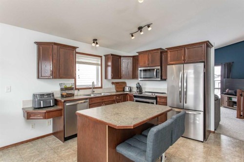 35 Landry Bend, Red Deer, AB - Indoor Photo Showing Kitchen With Double Sink