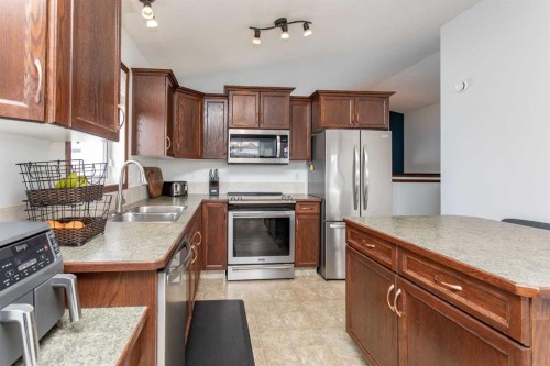 35 Landry Bend, Red Deer, AB - Indoor Photo Showing Kitchen With Double Sink