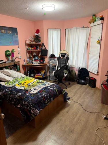 104 Kirkland Close, Red Deer, AB - Indoor Photo Showing Bedroom