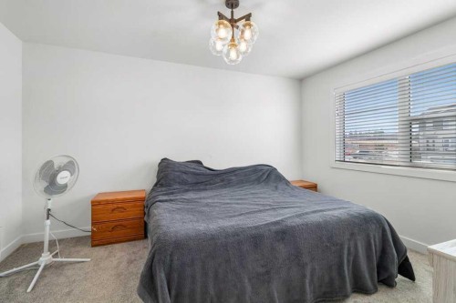 4143 Ryders Ridge Boulevard, Sylvan Lake, AB - Indoor Photo Showing Bedroom