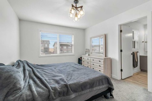 4143 Ryders Ridge Boulevard, Sylvan Lake, AB - Indoor Photo Showing Bedroom