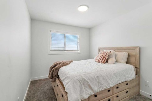 4143 Ryders Ridge Boulevard, Sylvan Lake, AB - Indoor Photo Showing Bedroom