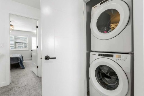 4143 Ryders Ridge Boulevard, Sylvan Lake, AB - Indoor Photo Showing Laundry Room