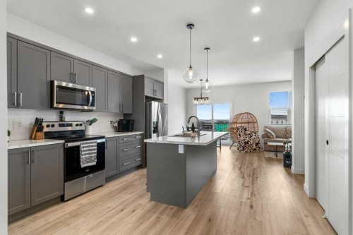 4143 Ryders Ridge Boulevard, Sylvan Lake, AB - Indoor Photo Showing Kitchen With Upgraded Kitchen