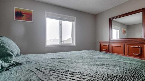 148 Valley Crescent, Blackfalds, AB - Indoor Photo Showing Bedroom