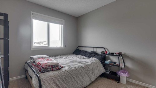 148 Valley Crescent, Blackfalds, AB - Indoor Photo Showing Bedroom
