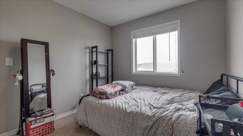 148 Valley Crescent, Blackfalds, AB - Indoor Photo Showing Bedroom