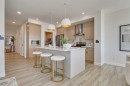 23 Verdure Gate Sw, Calgary, AB  - Indoor Photo Showing Kitchen With Stainless Steel Kitchen With Upgraded Kitchen 