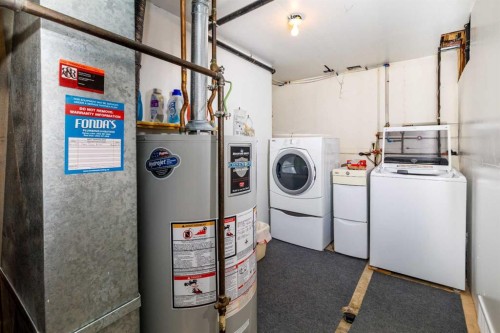 7 Mclevin Crescent, Red Deer, AB - Indoor Photo Showing Laundry Room