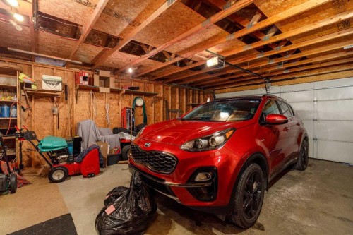 7 Mclevin Crescent, Red Deer, AB - Indoor Photo Showing Garage