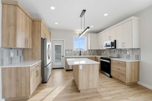 41 Emmett Crescent, Red Deer, AB - Indoor Photo Showing Kitchen With Stainless Steel Kitchen With Upgraded Kitchen