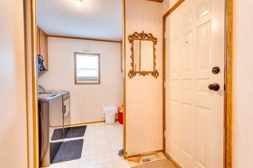 154 Devilder, Trochu, AB - Indoor Photo Showing Laundry Room