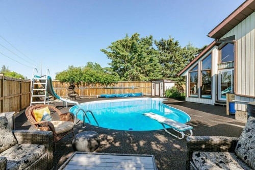 14 Warwick Drive, Red Deer, AB - Outdoor With In Ground Pool