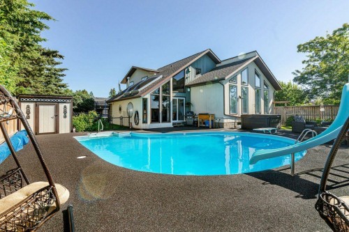 14 Warwick Drive, Red Deer, AB - Outdoor With In Ground Pool With Exterior