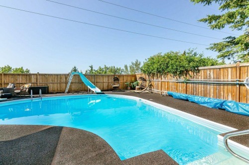 14 Warwick Drive, Red Deer, AB - Outdoor With In Ground Pool With Backyard