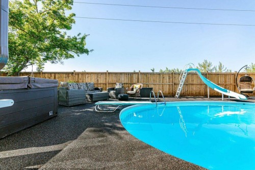 14 Warwick Drive, Red Deer, AB - Outdoor With In Ground Pool With Backyard