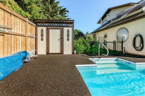 14 Warwick Drive, Red Deer, AB - Outdoor With In Ground Pool