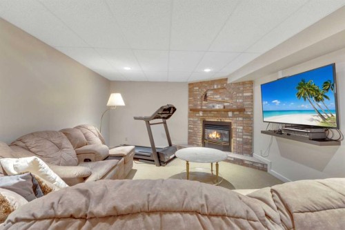38459 Range Road 283, Rural Red Deer County, AB - Indoor With Fireplace