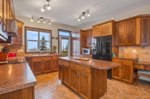 7135 Henner'S Road, Lacombe, AB - Indoor Photo Showing Kitchen With Double Sink
