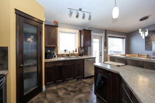 1 Ralston Place, Sylvan Lake, AB - Indoor Photo Showing Kitchen With Double Sink