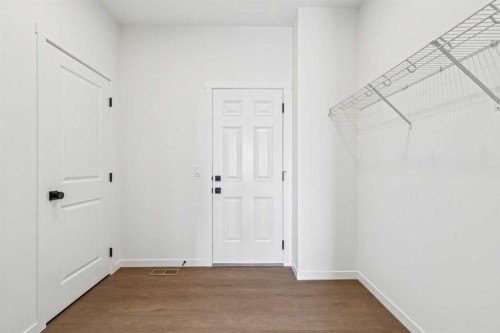 208 Southborough Common, Cochrane, AB - Indoor Photo Showing Other Room