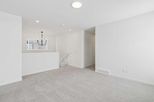 208 Southborough Common, Cochrane, AB - Indoor Photo Showing Other Room