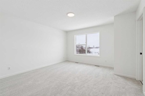 208 Southborough Common, Cochrane, AB - Indoor Photo Showing Other Room