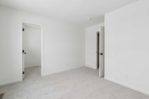 208 Southborough Common, Cochrane, AB - Indoor Photo Showing Other Room
