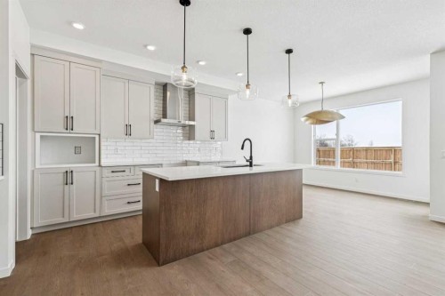 208 Southborough Common, Cochrane, AB - Indoor Photo Showing Kitchen With Upgraded Kitchen