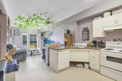 108-80A Kelloway Crescent, Red Deer, AB - Indoor Photo Showing Kitchen With Double Sink