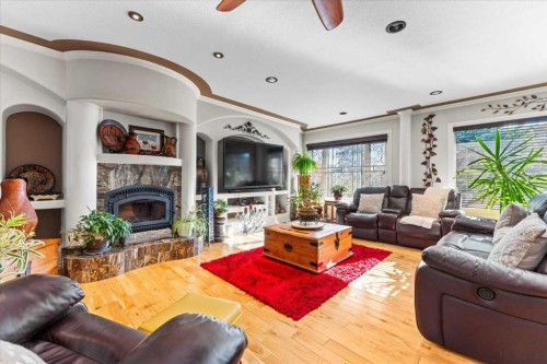 11124 110A Avenue, Edmonton, AB - Indoor Photo Showing Living Room With Fireplace