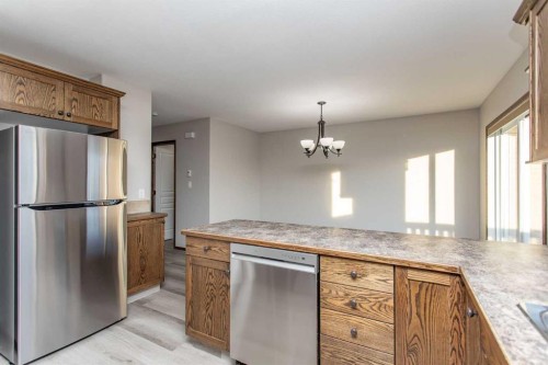 92 Iron Wolf Boulevard, Lacombe, AB - Indoor Photo Showing Kitchen